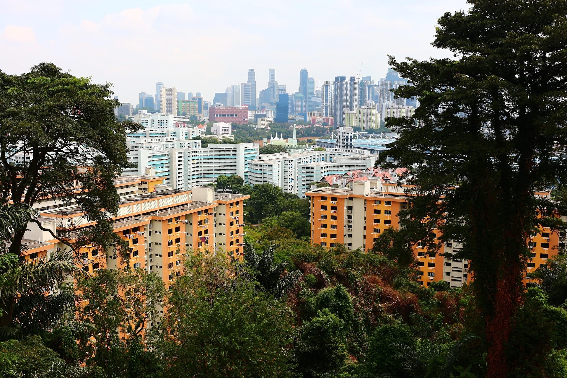 Singapore HDB blocks against the CBD skyline — representing seller marketing in the urban market